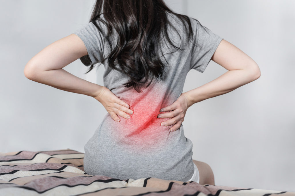 woman suffering from back pain